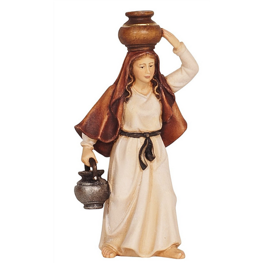 Woman carrying water with a jug 